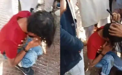 haridwar   गंगा घाट पर प्रेमिका के साथ बैठे मुस्लिम युवक का सिर मुंडवाया  वीडियो वायरल